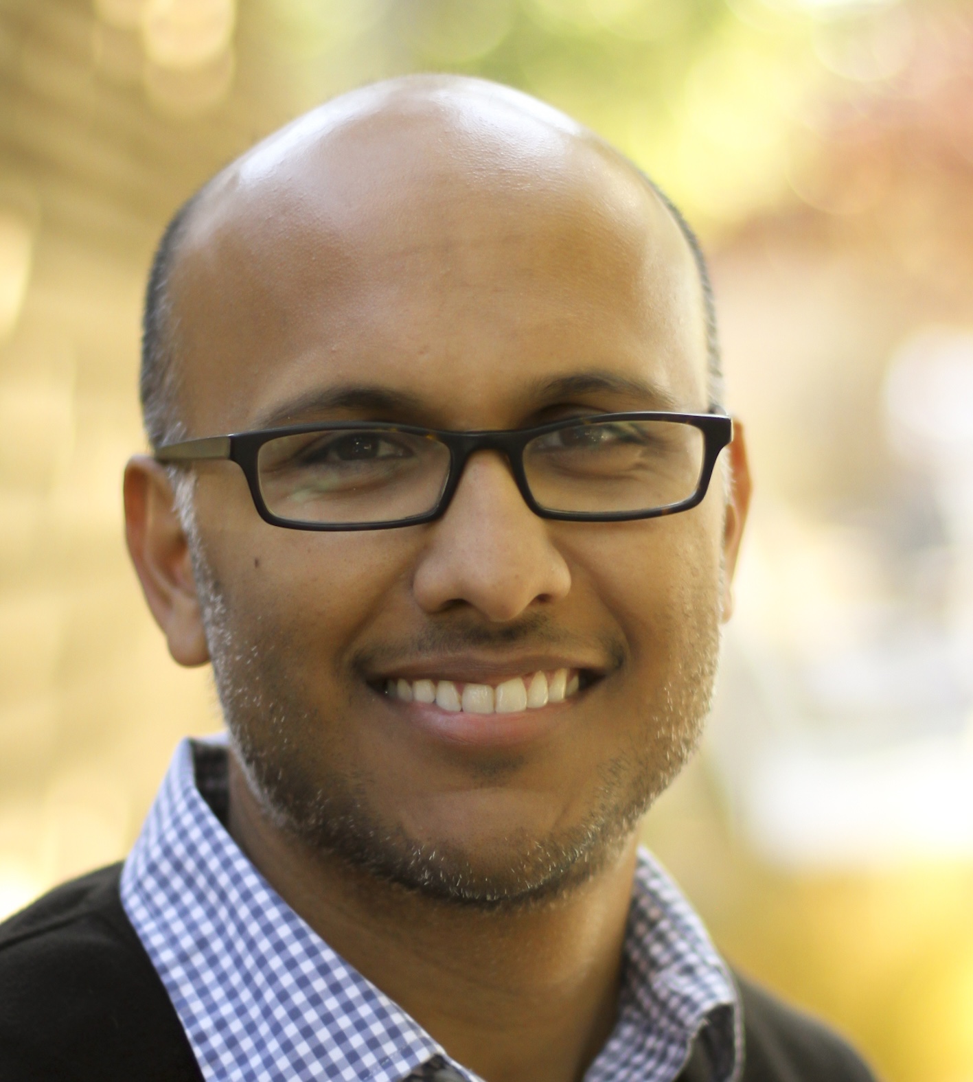 Headshot of Monty Mitra
